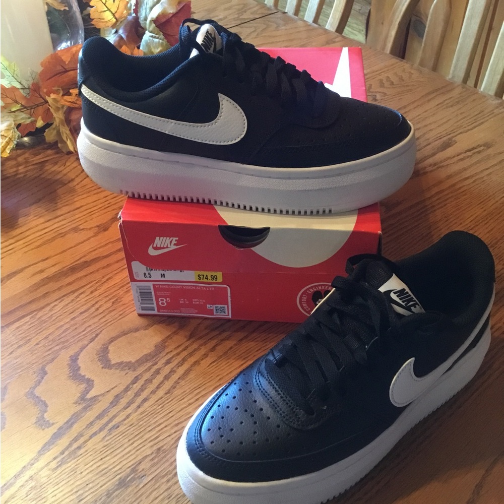 Nike Women’s Black Sneakers with White Swoosh